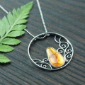 srebrny naszyjnik ażurowe koło z bursztynem