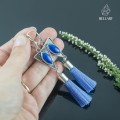 srebrne kolczyki  trójkąty z lapis lazuli i z błękitnym chwostem