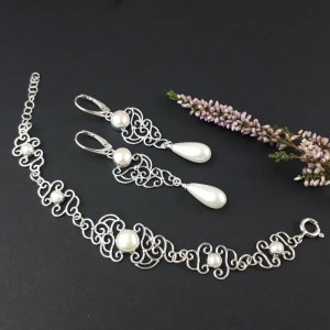 Srebrny ażurowy komplet z perłami