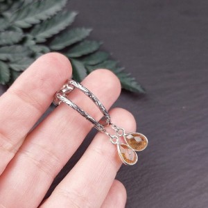 Srebrne kolczyki koła z wzorem flora i cytrynem